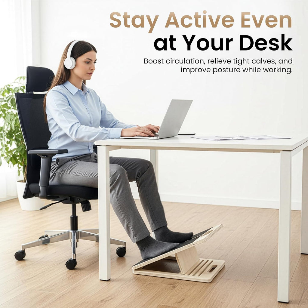 Woman using the slant board as a footrest under her desk